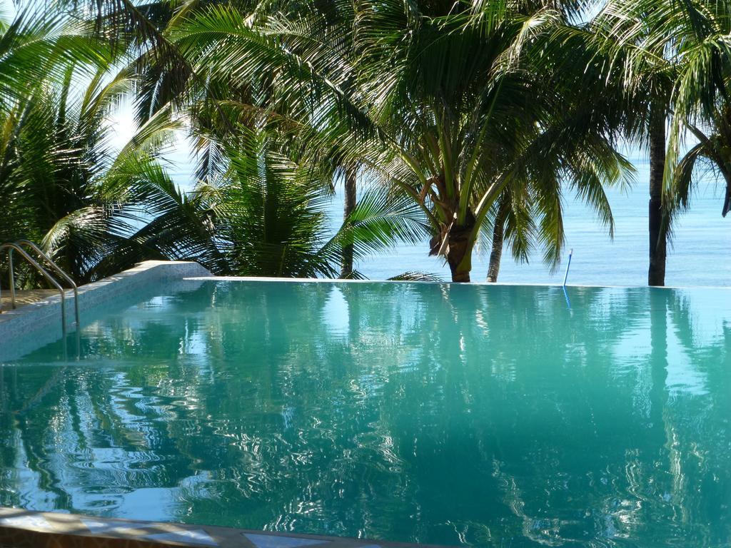 Reddoorz Premium @ Flower Beach Anda Esterno foto