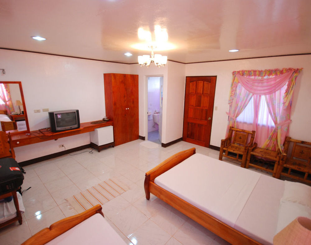 Reddoorz Premium @ Flower Beach Anda Esterno foto