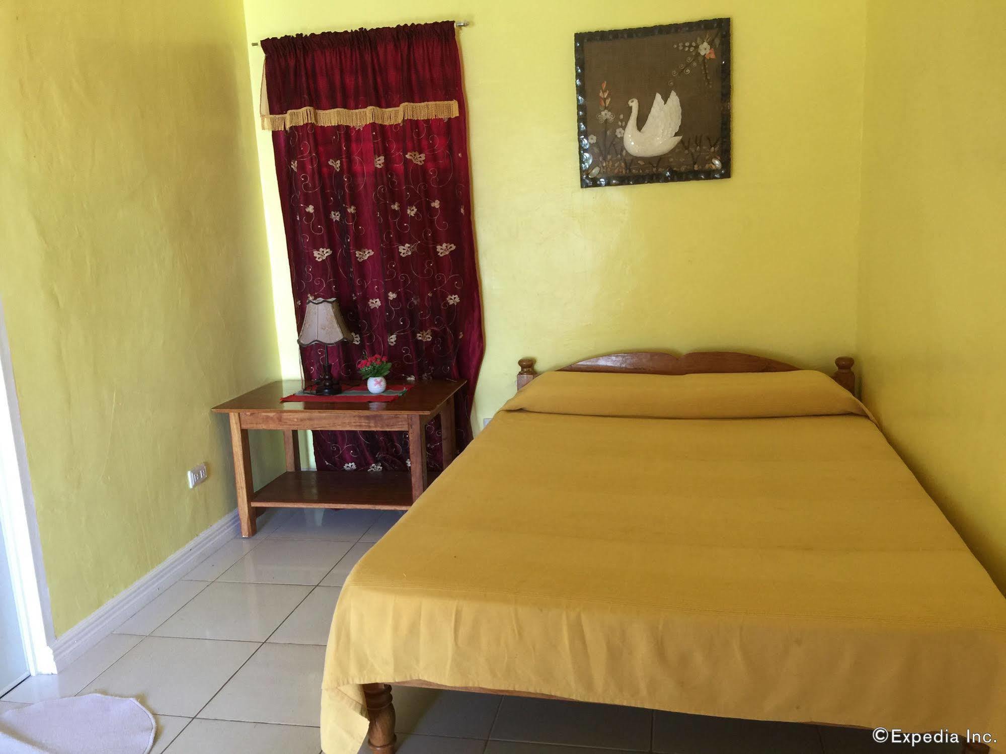 Reddoorz Premium @ Flower Beach Anda Esterno foto